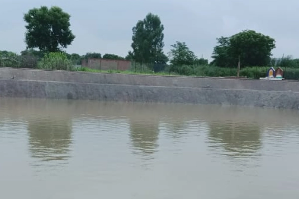 Image depicting improved rural conditions after development, with better infrastructure and community facilities.